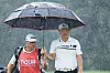 Im Sung-jae uses an umbrella on the second green during the first round of the Tour Championship at East Lake Golf Club on Thursday in Atlanta, Georgia. [GETTY IMAGES]