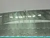 The Manchester City and Atletico Madrid flags hang at Seoul World Cup Stadium in western Seoul as heavy rain drenches the pitch an hour and a half before the two teams are set to kick off. [JIM BULLEY]