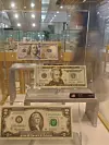 Dollar bills are displayed at Hana Bank's main branch in Myeong-dong of Jung District, central Seoul, on Wednesday. The International Monetary Fund (IMF)'s Assessing Reserve Adequacy on Wednesday rated Korea's foreign exchange reserve adequacy last year at 97 percent. Korea's foreign reserve fell short of the IMF's advisory rating for three straight years. [YONHAP]