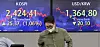 A screen in Hana Bank's trading room in central Seoul shows the Kospi closing at 2,399.04 points on Wednesday, up 25.37 points, or 1.06 percent, from the previous trading day. [YONHAP]