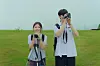 Kim You-jung, left, portrays a 17-year-old high school student who goes through turbulence in her romance and friendship in the Netflix film “20th Century Girl.” [NETFLIX]
