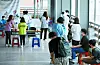 People go through diagnostic tests at a Covid-19 testing site in Gwangju on Monday. [YONHAP]