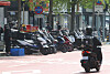 Delivery motorcycles are parked on a street in Yongsan District, central Seoul, on April 18, 2022. [YONHAP]