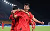 Korea's Lee Han-beom celebrates scoring during a Hangzhou Asian Games group stage match against Bahrain at Jinhua Sports Centre Stadium in Jinhua, China on Sunday. [YONHAP]