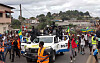 This video grab shows coup supporters cheering police officers in Libreville, Gabon, Wednesday Aug. 30, 2023. Mutinous soldiers speaking on state television announced that they had seized power in and were overturning the results of a presidential election that had seen Gabon President Ali Bongo Ondimba extend his family's 55-year hold on power. [AP/YONHAP]