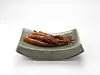 Insam Jeonggwa, a crispy and chewy snack made by combining ginseng with honey, sugar water or rice syrup, served on top of a plate inspired by Goryeo celadon. [ARUMJIGI]