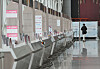 Travel agency booths at Incheon International Airport Terminal 1 are almost empty on July 20. [YONHAP]