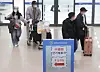 Passengers from China arrive at Incheon International Airport on Thursday afternoon. [YONHAP]