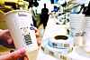 A bar code is attached to a disposable cup for take-out. A deposit-return system for disposable cups will begin in the city of Sejong and Jeju Island starting Friday. [JANG JIN-YOUNG]