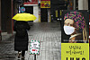 A person walks along an empty street in Myeong-dong in central Seoul on Tuesday. The coronavirus pandemic has greatly reduced household consumption, leading to a minus 1-percent growth in the country's real gross domestic product (GDP) last year, according to data by the Bank of Korea. [YONHAP]
