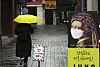 A person walks along an empty street in Myeong-dong in central Seoul on Tuesday. The coronavirus pandemic has greatly reduced household consumption, leading to a minus 1-percent growth in the country's real gross domestic product (GDP) last year, according to data by the Bank of Korea. [YONHAP]
