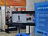 A screen at iPixel's booth at 2024 KIMES Busan demonstrates the digital healthcare startup's Exercite Care app. [IPIXEL]
