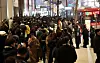A crowd of people wait in line to take their buses back home at Myeong-dong in Jung District, central Seoul on Thursday. [YONHAP]