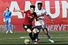 Real Madrid's Aurelie Tchouameni, right, in action against Mallorca's Lee Kang-in during a La Liga match in Mallorca, Spain on Sunday. [EPA/YONHAP]