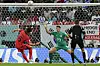 Hwang Ui-jo, left, misses a chance to score during a World Cup Group H match against Uruguay at Education City Stadium in Qatar on Thursday. [AP/YONHAP]