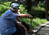 An old man takes a rest in the Tapgol Park in central Seoul on July 25. [NEWS1]