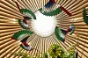 Atelier Oi's 'Quetzal,' a large decorative mobile inspired by the eye-catching plumage of South American quetzals at Louis Vuitton Maison Seoul [LOUIS VUITTON]