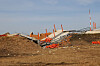 The damaged localizer mound at the site of the Jeju Air crash remains unattended at Muan International Airport, as a joint memorial service for the victims is held on Jan. 18. [KIM HYUN-DONG]