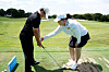 Park In-bee, right, gives a golf lesson to junior golfer Kim Ha-eun at Black Stone Country Club in Jeju on Wednesday. [KLPGA]