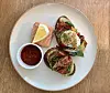 Avocado on toast with smoked salmon and tomato relish sauce at Lucyd [LEE JIAN]
