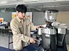 Pebble Company's CEO Lee Gi-hoon makes coffee at the company's barista training center in Mapo District, western Seoul [LEE JIAN]