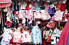Korean traditional clothing, or hanbok, hanging at a store in Namdaemun, Seoul, on Sunday, less than a week before the Lunar New Year holidays. Usually during this period, one of the two most celebrated traditional holidays in Korea, sales surge with consumers opening up their wallet. But this year, as the government continues to implement strict social distancing in hopes of curbing the number of new Covid-19 cases, many stores fear heavy losses. [YONHAP]