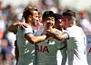 Tottenham Hotspur's Harry Kane, left, celebrates scoring their first goal with Son Heung-min, center, and Pierre-Emile Hojbjerg during a friendly against Shakhtar Donetsk at Tottenham Hotspur Stadium in London on Aug. 6. [REUTERS/YONHAP]