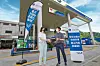 Models pose to promote Hyundai Oilbank's new online secondhand goods market, dubbed ″BLUE Market.″ The new service, which will run inside its existing BLUE application, allows users to use its gas stations as a meeting point to exchange goods. [YONHAP]