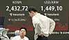 A screen in Hana Bank's trading room in central Seoul shows the Kospi closing at 2,432.72 points on April 11, down 12.34 points, or 0.5 percent, from the previous trading session. [NEWS1]