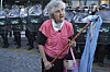 A protester holds an Argentine flag outside Congress during weekly demonstrations demanding better pensions for retirees and opposing austerity measures by Javier Milei's government, in Buenos Aires, Argentina, on March 26. [AP/YONHAP]