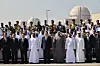 President Yoon Suk Yeol, center, poses for a commemorative photo at the Barakah nuclear power plant on Monday during a state visit to the United Arab Emirates (UAE). [JOINT PRESS CORPS]