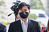 Former YG Entertainment CEO Yang Hyun-suk appears for his ruling on Wednesday at the Seoul High Court [YONHAP]