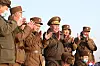 Ri Pyong-chol, third from right, a secretary of the Central Committee of the North Korea’s ruling Workers' Party, claps while watching the successful launch of Pyongyang’s new-type tactical guided missiles Thursday from Hamju, South Hamkyong Province, reported the North’s official Korean Central News Agency Friday. Ri issued a statement Saturday lambasting U.S. President Joe Biden’s remarks criticizing the North’s short-range ballistic missile launches. [YONHAP]