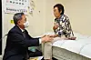 Foreign Minister Park Jin, left, listens to Yang Keum-deok, a victim of Japan's Mitsubishi Heavy Industries's wartime forced labor, during a visit to Yang's house in Gwangju on Sept. 2, 2022. [YONHAP]