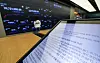A tablet PC at Upbit lounge in Gangnam District, southern Seoul, on Monday displays a notice of the exchange ending trading of 23 coins from noon that day. While the exchange announced plans to delist 24 coins on June 18, trading of one more coin will end on July 3. [YONHAP]