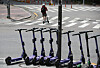 E-scooters parked around Hongik University in western Seoul on Tuesday. The once-popular ride has lost many users since tough restrictions, requiring a drivers license and helmet and banning more than one person from riding on the same scooter, were implemented from May 13.  [YONHAP]