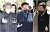 Senior police officers including Kim Jin-ho (former intelligence officer at the Yongsan Police Station), Park Sung-min (former high-ranking intelligence officer at the Seoul Metropolitan Police Agency), center, and Lee Im-jae (former Yongsan police chief), right, come out of a court hearing on Monday. [YONHAP]