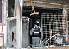 An investigator from Gyeonggi Disaster and Safety Headquarters inspects the Nigerian family's house in Seonbu-dong in Danwon District, Gyeonggi, which was entirely burned after a fire broke out Monday morning, killing four Nigerian siblings. [NEWS1]