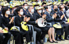 Former President Moon Jae-in, center left, and his wife Kim Jung-sook, center right, clap at a memorial service to mark the 13th anniversary of the death of former President Roh Moo-hyun in Bongha Village in Gimhae, South Gyeongsang, Monday afternoon, with Roh’s widow Kwon Yang-sook. [JOINT PRESS CORPS]