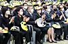 Former President Moon Jae-in, center left, and his wife Kim Jung-sook, center right, clap at a memorial service to mark the 13th anniversary of the death of former President Roh Moo-hyun in Bongha Village in Gimhae, South Gyeongsang, Monday afternoon, with Roh’s widow Kwon Yang-sook. [JOINT PRESS CORPS]