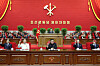 North Korean leader Kim Jong-un, center, and top party officials sit at a leadership podium to mark the opening of the 8th Congress of the ruling Workers' Party on Tuesday. [NEWS1]