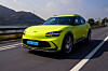 Lime-colored Genesis GV60 on road [HYUNDAI MOTOR]