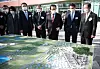 Prime Minister Chung Sye-kyun, third from right, looks at a model of a hydrogen plant at the factory of SK Incheon Petrochem on Tuesday, with SK Chairman Chey Tae-won, second from right, and Hyundai Motor Chairman Euisun Chung, fourth from right.
