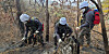 Soldiers from the 39th Infantry Division of the Korean Army extinguish embers from a wildfire in Hapcheon County, South Gyeongsang, on Thursday. [YONAHP]