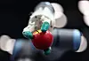 A robot holds an apple at Industrial-TECH Fair 2024 at Coex in southern Seoul on Wednesday. [YONHAP]