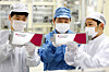 LG Energy Solution researchers check batteries for electric vehicles at its Ochang plant in North Chungcheong. [LG ENERGY SOLUTION]