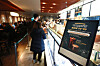 Customers place their orders at a Starbucks branch in Jung District, central Seoul on Feb. 22, when the coffeehouse chain offered a promotion selling a tall size Americano for 2,500 won ($1.92) for three days. [YONHAP]