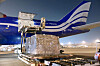 Masks are loaded onto a U.S. cargo plane at Incheon International Airport early Monday to be delivered to the United States. Korea said it will send 2 million face masks to be used by U.S. medical workers as a part of efforts to support its ally and efforts toward joint Covid-19 response. [U.S. Embassy]