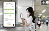 A model checks how busy subway cars are via her smartphone. SK Telecom partnered with Seoul Metro and T Map Mobility to develop an application that shows real-time data about subway car congestion. Only data regarding Seoul's Line 2 is provided as of Wednesday, but the company plans to expand their services. [SK TELECOM]
