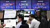 The Kospi closed up 1.15 percent to 2,399.04 points on Tuesday, while the won's value rose 1.16 percent at 1,384.90 to the dollar. It was the first time the won closed below 1,400 won since Sept. 21. [YONHAP]